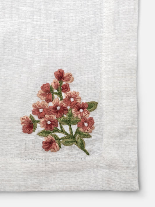Close-up of embroidered detail on linen napkin