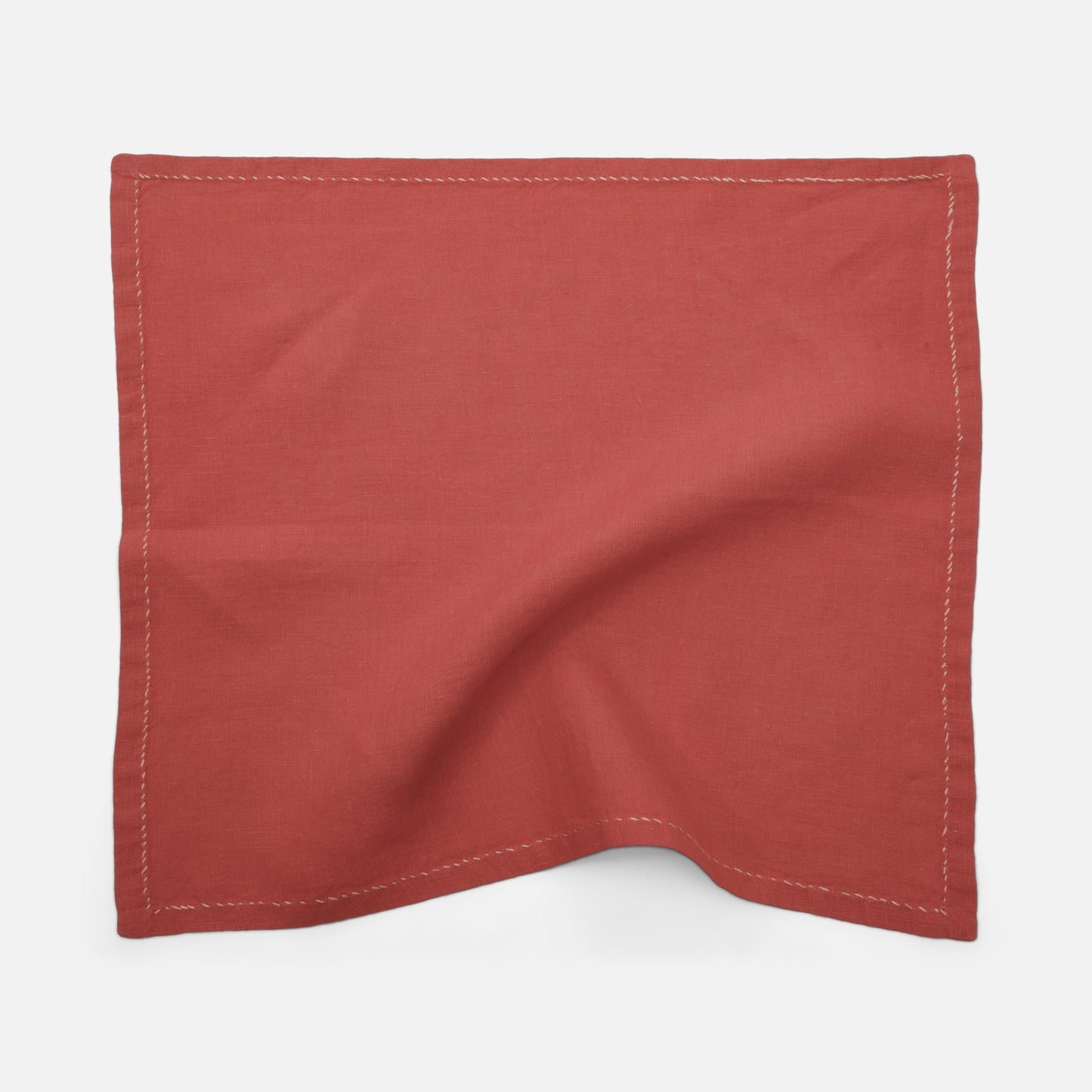 Decorative linen napkins with coral stitching