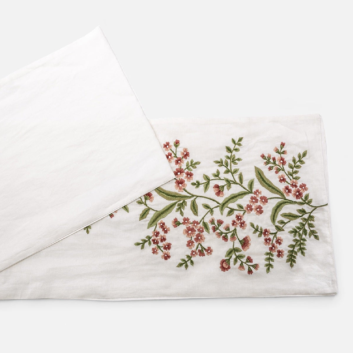 Elegant embroidered runner for modern dining table