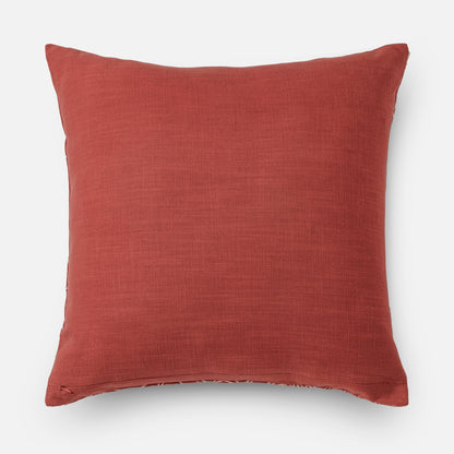 Textured coral pillow with subtle embroidery (back side of cushion)