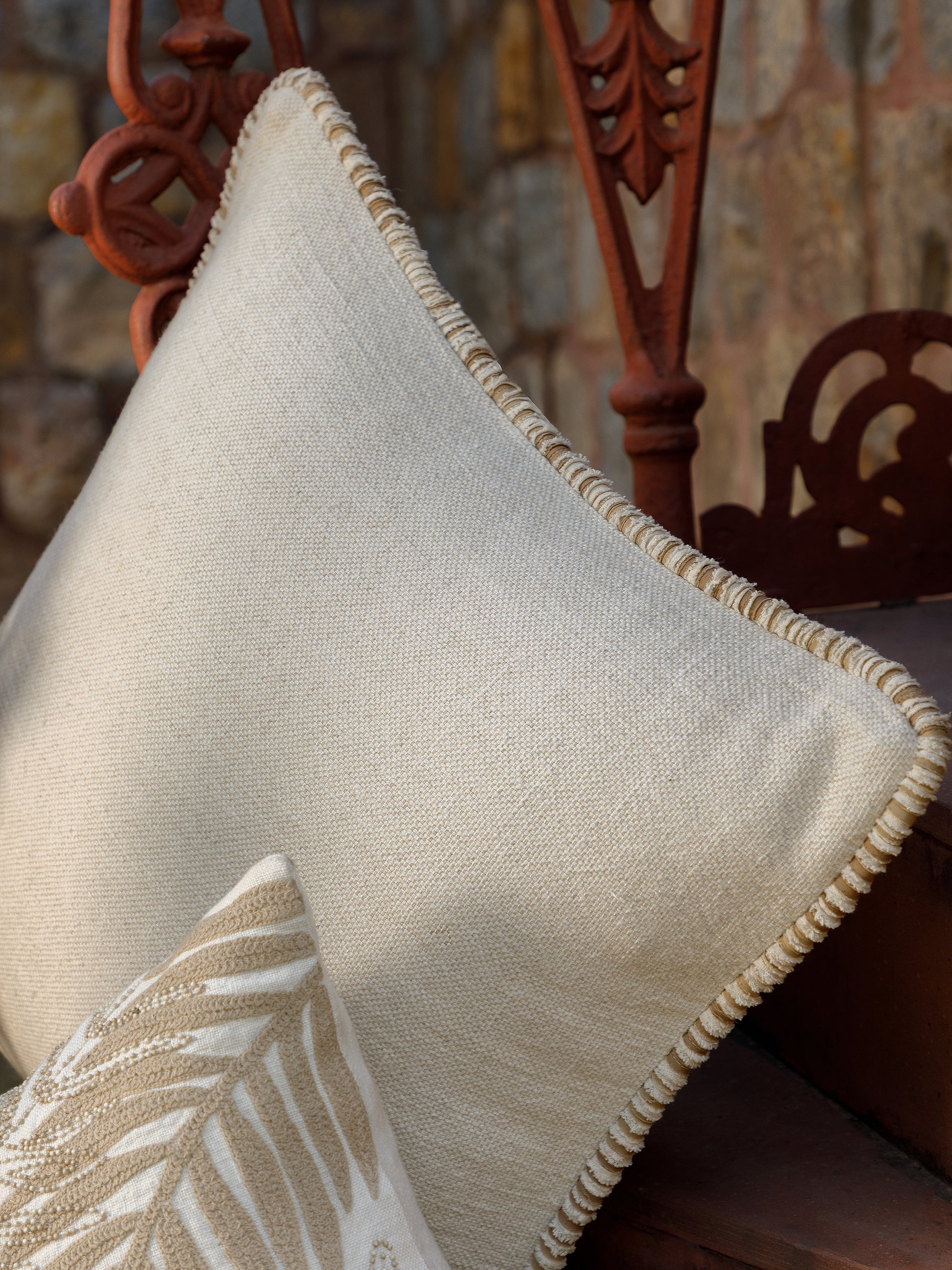 Neutral linen cushion styled on sofa 51x51 cm