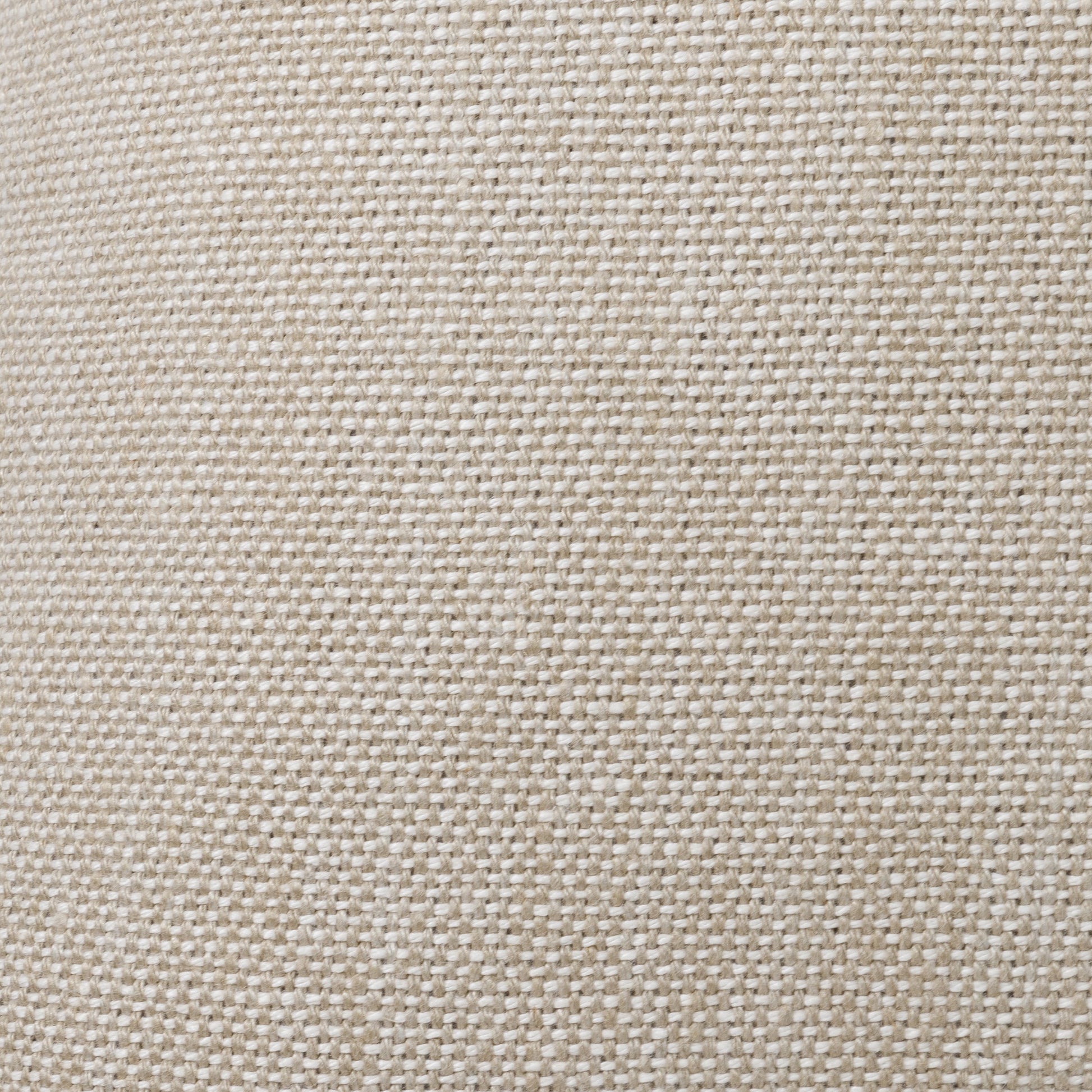 Textured natural fabric cushion with tonal stitching