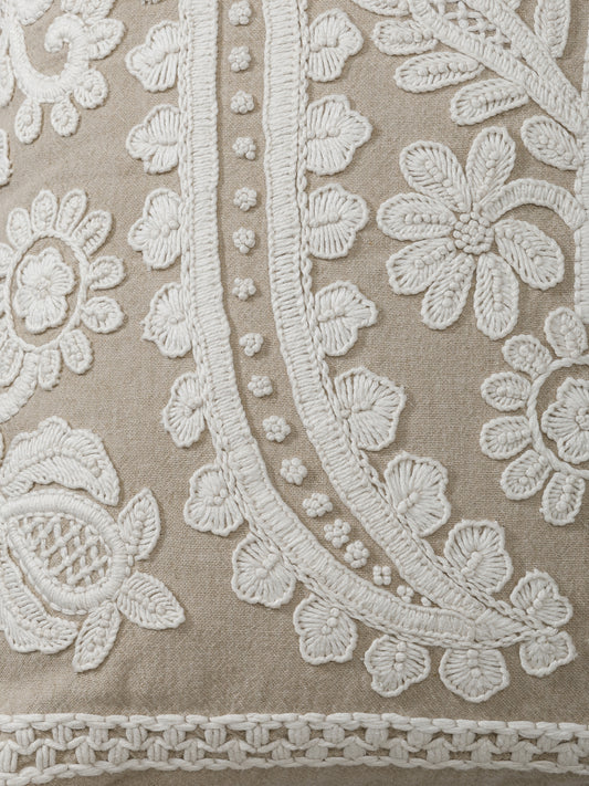 Close-up of raised embroidery on chambray cushion