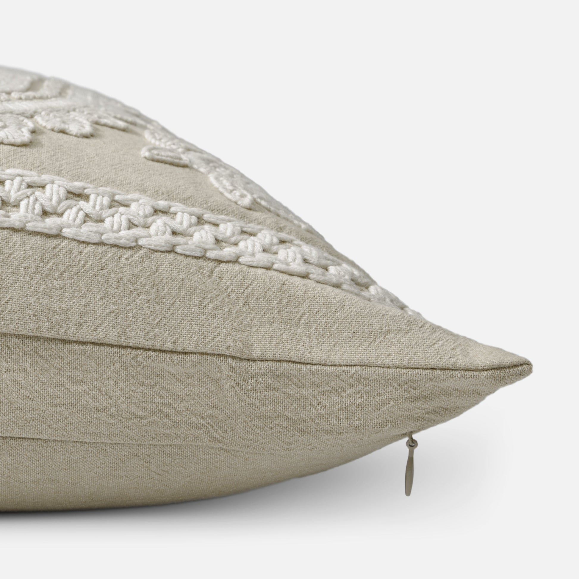 Detailed stitched pattern on cotton cushion
